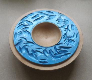 Coloured carved dish won a commended certificate for Geoff Christie